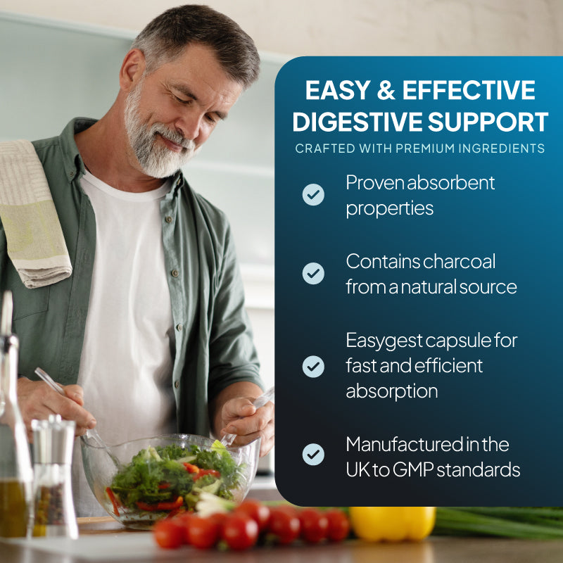 Lifestyle promotional graphic for Simply Supplements Activated Charcoal 300mg, showing a grey-haired man preparing a salad in a kitchen beside a dark blue text panel that reads “Easy & Effective Digestive Support,” with points highlighting proven absorbent properties, charcoal from a natural source, EasyGest capsules for fast and efficient absorption, and UK manufacture to GMP standards.
