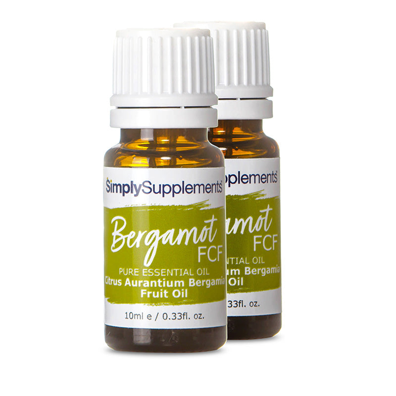 Two bottles of Simply Supplements Bergamot FCF essential oil on a white background