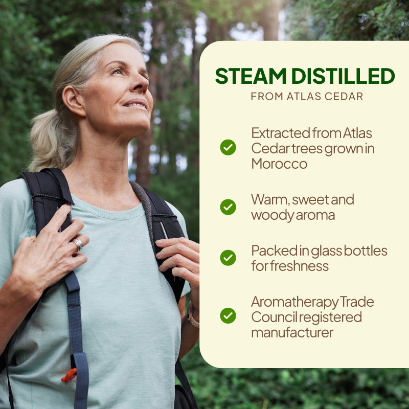 Simply Supplements Cedarwood essential oil lifestyle graphic highlighting steam-distilled Atlas cedar oil from Morocco, warm sweet woody aroma, glass bottle packaging and Aromatherapy Trade Council registered manufacturer.