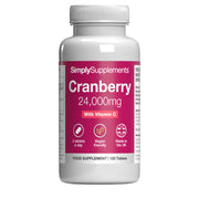 Supplement bottle with cranberry and vitamin C on a white background