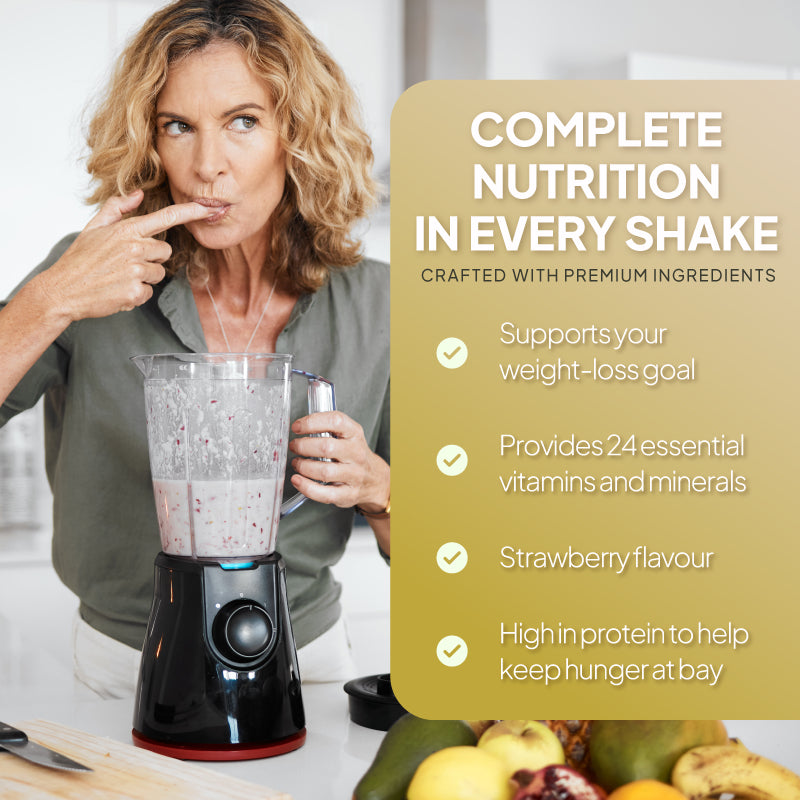 Woman blending a strawberry meal replacement shake beside a nutrition graphic highlighting high protein and 24 essential vitamins and minerals