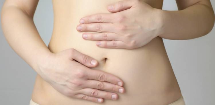 Bloated Stomach: Symptoms, Causes & Treatment